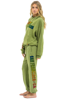 OUTSIDE LANDS 2025 UNISEX SWEATPANTS - JUNGLE GREEN