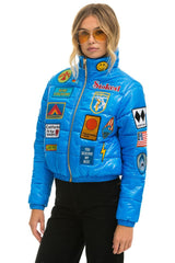 VINTAGE PATCH APRES PUFFER JACKET - BLUE CINA GLOSSY Women's Outerwear Aviator Nation 